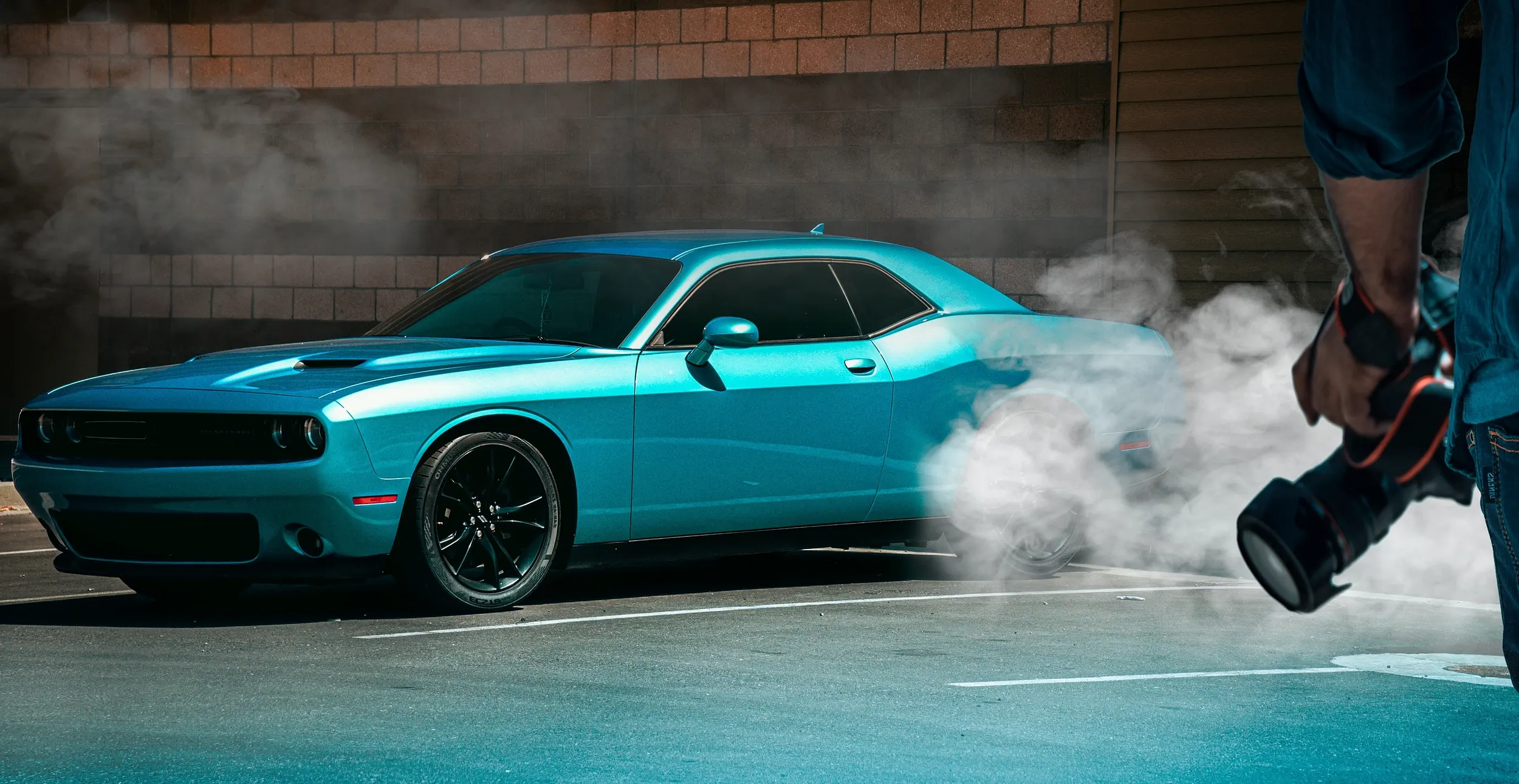Dodge Challenger Burning Rubber with Photographer